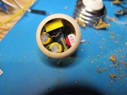 Interior of an LED bulb showing visible electronic components.