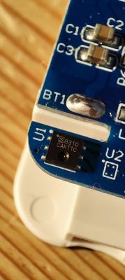 Close-up of a circuit board with a Sensylink SHT8310 sensor.
