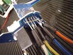 Close-up of a circuit board with connected wires.