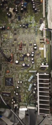Mainboard of an electronic device with highlighted connectors P354A and P691B, and a corroded trace marked.