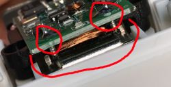 The image shows a coil and two leads on a PCB connected to a rectifier bridge.