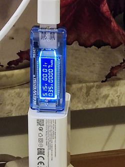 Current meter display showing 5.15 V and 0.335 A.