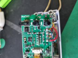 Close-up of GR2PW device PCB with visible connectors, wires, and Wi-Fi and power module labels.