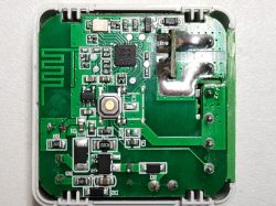 Circuit board of a device with electronics and components.