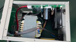 Interior view of a Korad power supply with electronic components.