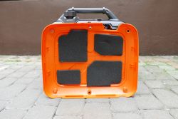 Portable Generator Cover with Soundproofing Foams Cover of a portable generator with four attached soundproofing foams.