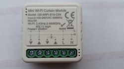 Mini Wi-Fi Curtain Module QS-WIFI-S10-C04 Mini Wi-Fi Curtain Module QS-WIFI-S10-C04 with technical specifications printed on the casing and visible screw terminals.
