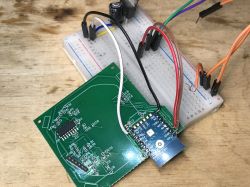 WiFi Module Connected to Circuit Board Circuit board with attached module and wires.