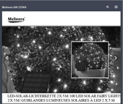 Girlanda solarna LED na krzewie z panelem solarnym.