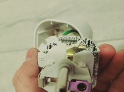 Interior of LIDL SAPM 1 A1 Smart Plug Close-up of the interior of a LIDL SAPM 1 A1 smart plug showing electronic components.
