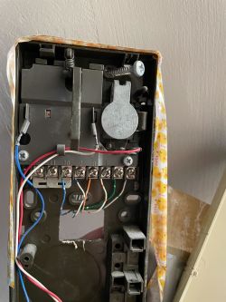 View of the intercom interior with connected wires.