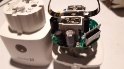 Socket interior module with visible capacitors and PCB board