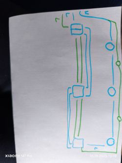Schemat narysowany markerami niebieskim i zielonym na białej kartce