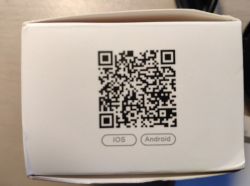 QR Code for App on Packaging Photo of packaging with a QR code and iOS and Android labels.