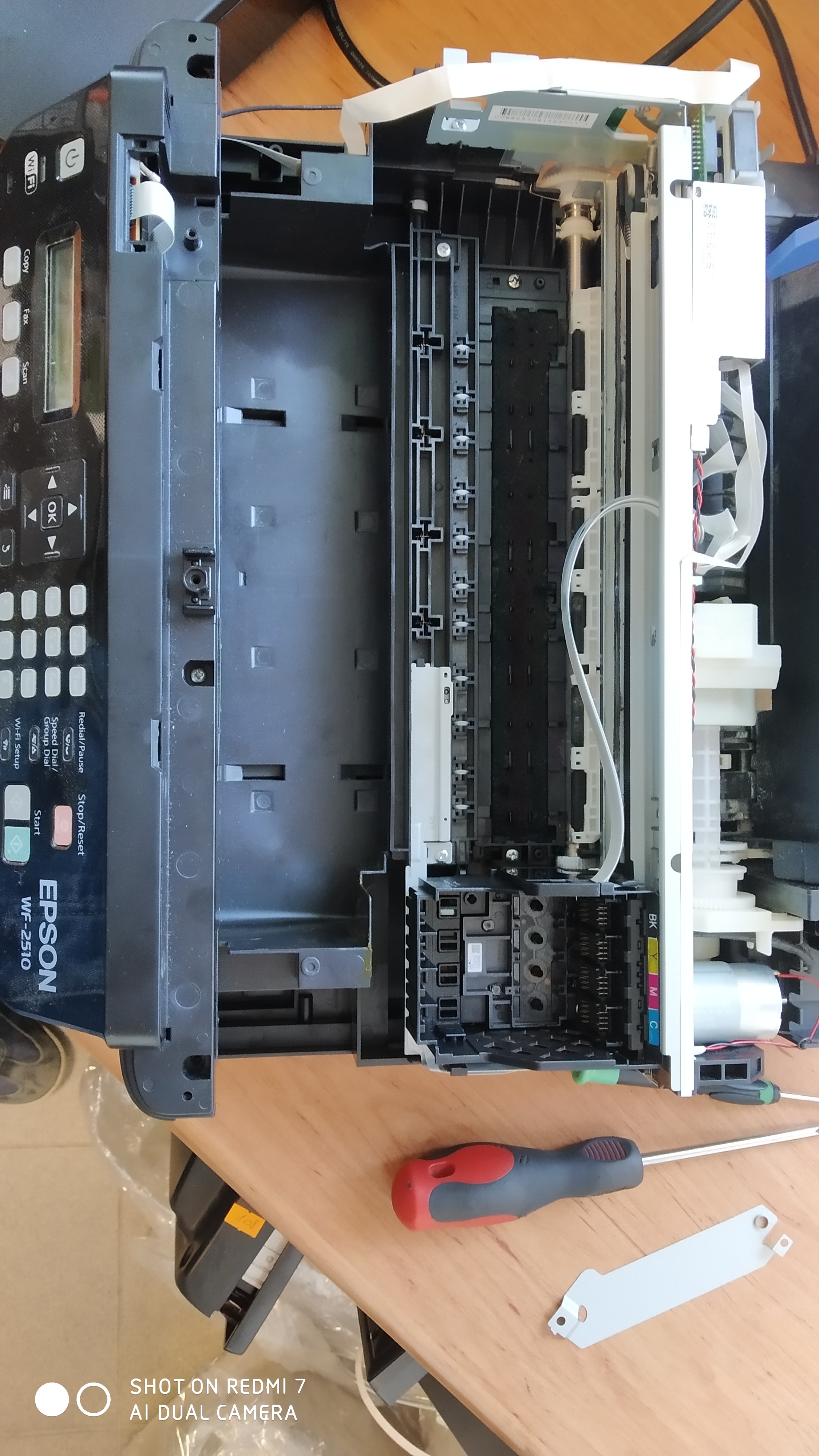 Epson WF2510 Usunięcie głowicy z zatoki i naprawa błędów drukarki