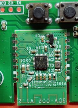 Close-up of a PCB with a BL602L20 chip and electronic components.