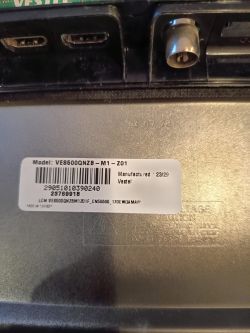 Back label of a Vestel TV showing model VES500QNZB-M1-Z01 and HDMI connectors