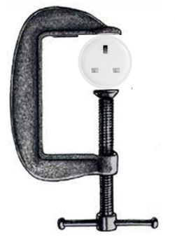 The image shows an electrical plug placed in a woodworking clamp.