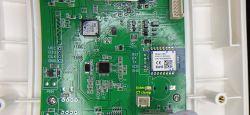 Inside of EV Charger Circuit Board with WBR3 Tuya Module EV charger circuit board with visible electronic components and WBR3 Tuya module.