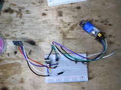 FL_M99 Module Connected to Breadboard FL_M99 module connected to a breadboard with wires and a USB adapter.