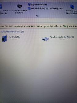 Zrzut ekranu z otoczenia sieciowego pokazujący urządzenia TL-WA854RE i TL-WR841N.