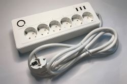 White power strip with 6 230V sockets, 3 USB ports, and a round power button