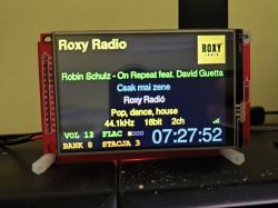 Player display shows Roxy Radio, track title, time 07:27:52, and a station logo on the right