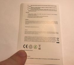 Power bank manual page showing CE, RoHS symbols and manufacturer details