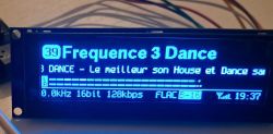 OLED screen showing FLAC audio stream and playback parameters