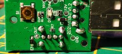 Close-up of a Printed Circuit Board for a USB Smart Switch Close-up of a printed circuit board with labels and connectors.