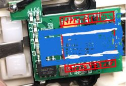PCB with electronic components, including a coil and a bridge rectifier.