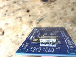 WiFi module ESP mounted on a printed circuit board.