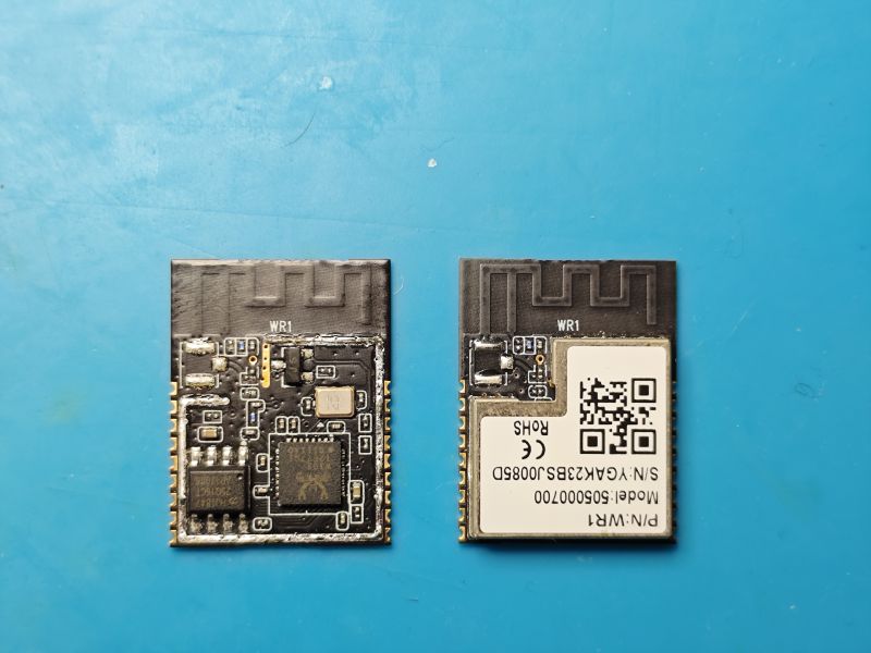 Two small PCB electronic modules with a trace antenna, on a blue background
