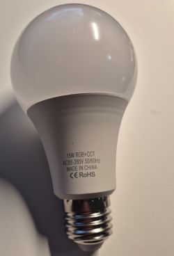 15W RGB+CCT smart LED bulb with technical markings on the casing.