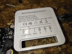 White plastic mini dimmable switch with technical specifications.