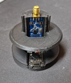 DIY RF controller with CC1101 and ESP32-S3 in black 3D-printed cylindrical case