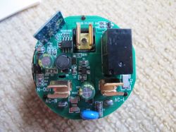 Inside of Tuya BSD29 UK 20A Plug Interior of Tuya BSD29 UK 20A plug with visible PCB components.