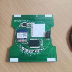 Printed circuit board with a communication module and electronic components.