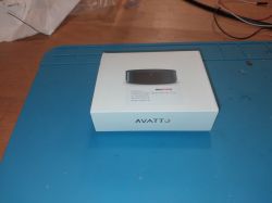 Box of AVATTO S16 IR Transmitter on a blue mat.