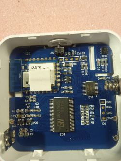 Circuit board inside a sensor with visible integrated circuits and connectors.