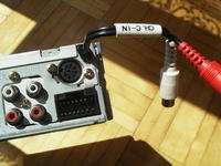 Jak podłączyć wejście AUX do radia samochodowego Panasonic FX620N?