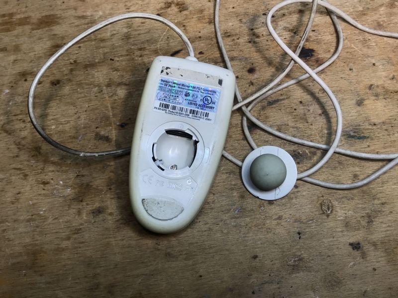 Inside view of an old Trekker ball mouse Old ball mouse Trekker without the ball.