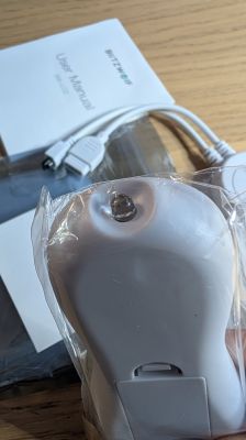 BlitzWolf BW-CLT2 remote in plastic wrap with accessories and user manual