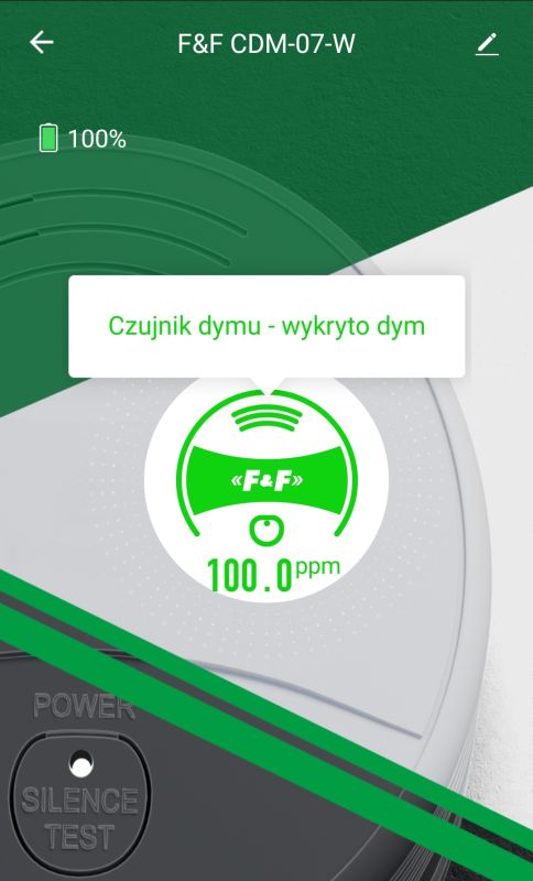 Ekran aplikacji czujnika dymu F&amp;F CDM-07-W pokazujący wykrycie dymu i poziom 100 ppm.