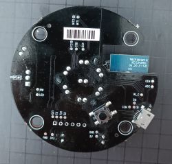 Printed circuit board of a universal infrared remote with electronic components.