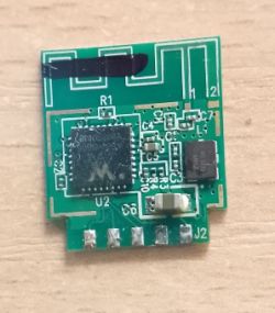 Image of a small electronic board with several components.