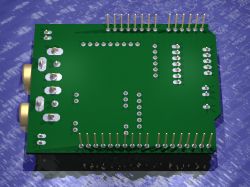 View of a printed circuit board with various connectors and pins designed as a shield for ESP32-Uno.
