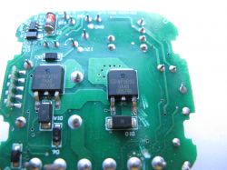 Cozylife DS-1321AL WiFi Switch Module Image of a Cozylife DS-1321AL WiFi switch module with integrated circuits on a green printed circuit board.