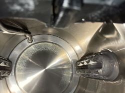 Interior of a stainless steel kettle with limescale deposit on the bottom