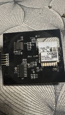 Printed circuit board with electronic components and a module labeled CBU.
